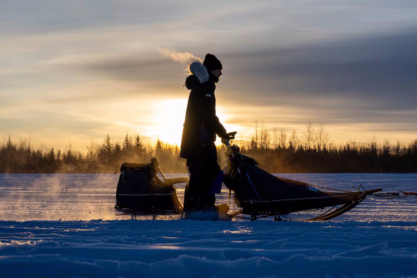 Hayden Caron mushes on the Tanana River during the 110-mile T-Dog race on Saturday, March 23, 2024 in Fairbanks. The Tanana Valley Sled Dog Races is Alaska